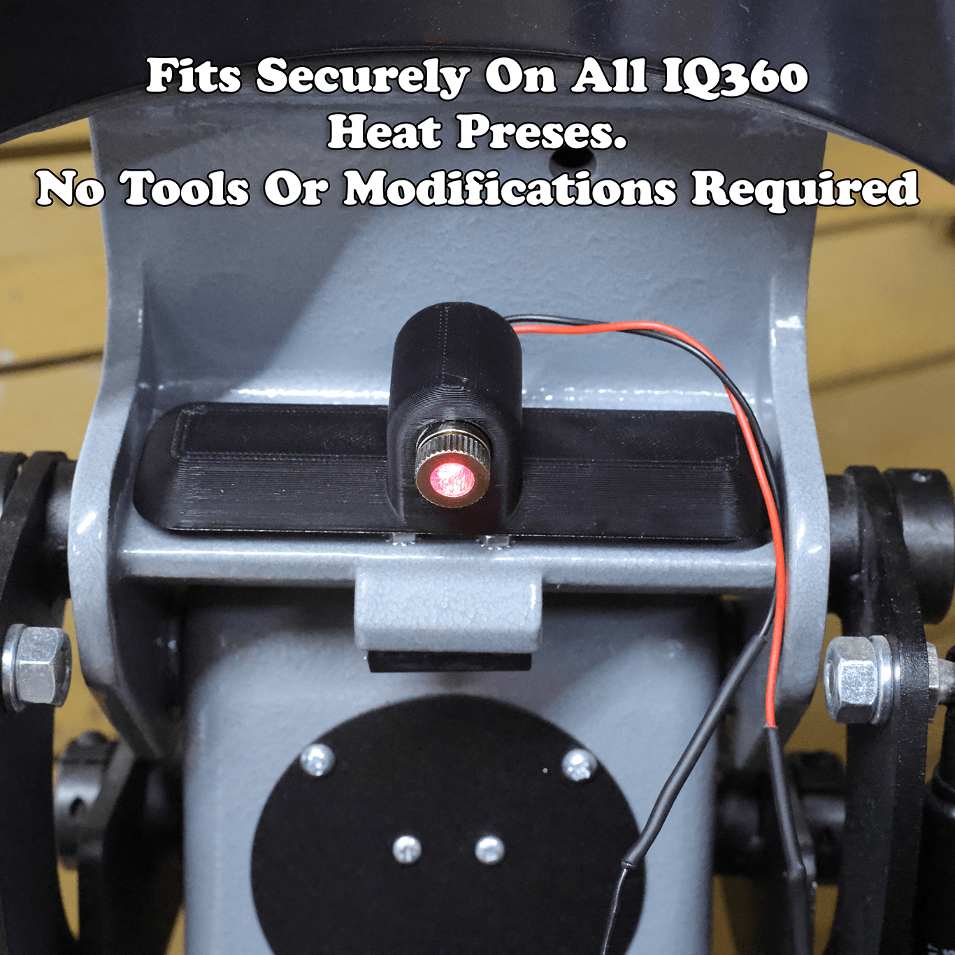 IQ360 laser alignment system projecting alignment lines onto a cap