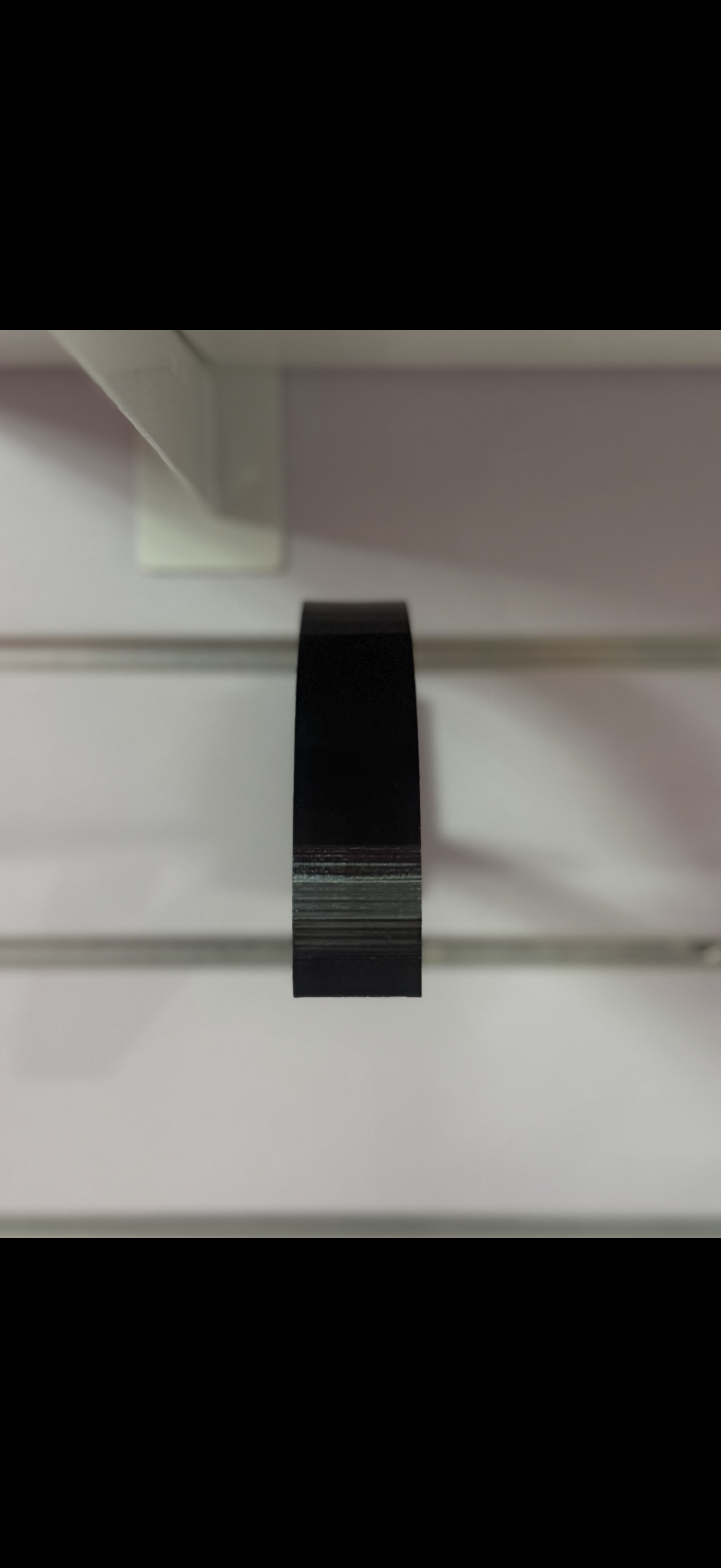 Slat wall hat hanger