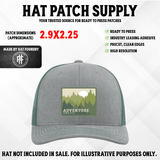 UV printed hat patch reading Adventure Awaits with an outdoor scene