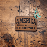 America Since 1776 leather hat patch shown at an angle