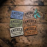 Patriotic leather hat patch reading America Since 1776