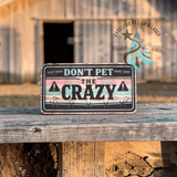 Retro rodeo style leather hat patch reading Don't Pet the Crazy