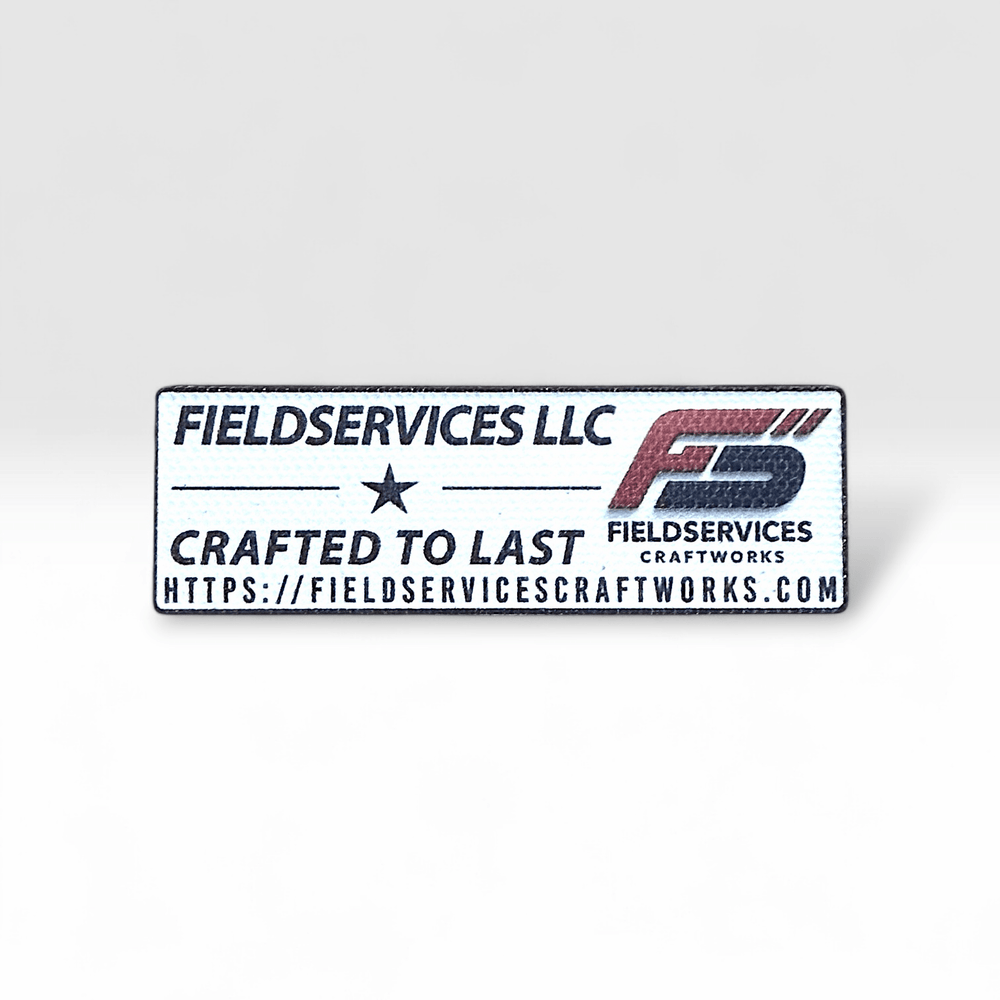 FoundryTag branding tag shown before application to a hat sweatband