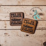 Leather hat patch reading Get in Loser, We're Going Fishing