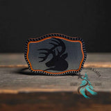 Stainless acrylic hat patch with a Hunter's Edge buck deer design