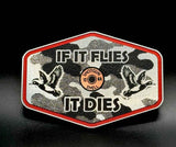 Close-up of the copper acrylic insert on the If It Flies linen camo hat patch