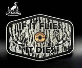 Two-piece acrylic hat patch reading If It Flies with a tree bark design and copper insert