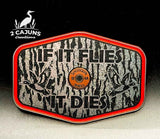Four color options of the If It Flies tree bark acrylic hat patch