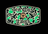 Close-up of the copper acrylic insert on the If It Flies hat patch