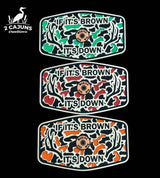 Two-piece acrylic hat patch reading If It's Brown It's Down, Merica edition with copper insert