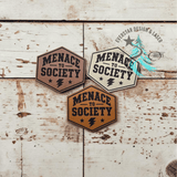 Laser engraved leather hat patch reading Menace to Society