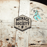 Close-up of the engraved Menace to Society leather hat patch