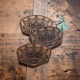 Laser engraved leather hat patch reading Petty Since Birth