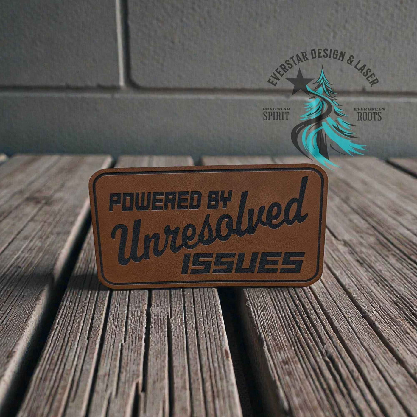 Powered by Unresolved Issues Leather Patch - Hat Patch Supply