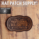 Laser engraved hat patch reading 'Professional Bullshitter'
