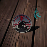 Stainless acrylic hat patch with a Redline Hunter buck design