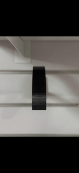 Close-up of the slat wall hat hanger bracket