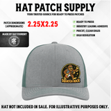 UV printed hat patch with a Bigfoot sasquatch design on a rock