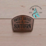 Close-up of the engraved Sweet, Sassy and Southern leather hat patch