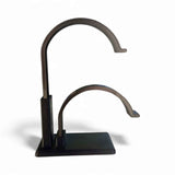 Close-up of the tabletop two-hat display stand construction