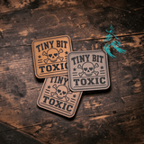 Alternate view of the Tiny Bit Toxic leather hat patch