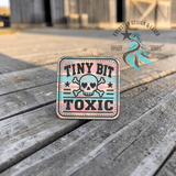 Retro rodeo style leather hat patch reading Tiny Bit Toxic