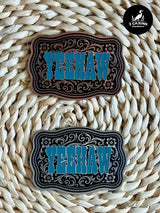 Laser engraved acrylic hat patch with YeeHaw lettering in a western scroll design